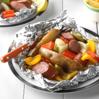 Potato-Sausage Foil Packs Recipe: How to Make It - Taste of Home: Find Recipes, Appetizers, Desserts, Holiday Recipes & Healthy Cooking Tips image