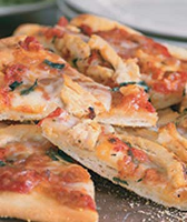 Pizza With Chicken and Basil Recipe | Real Simple image