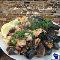 Seafood Medley in White Wine and Garlic Sauce | Wisconsin ... image