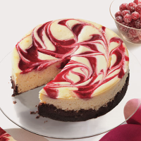 Cranberry Swirl Cheesecake Recipe | MyRecipes image