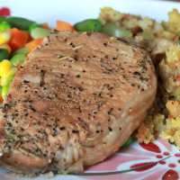Rosemary and Garlic Simmered Pork Chops Recipe | Allrecipes image