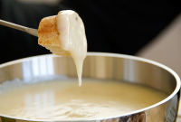 Classic Cheese Fondue with French Bread | Just A Pinch Recipes image
