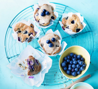 Maple-glazed blueberry muffins recipe - BBC Good Food image