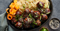 Sticky Asian Meatballs with Udon Noodles - PureWow image