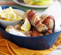 Bacon-wrapped chicken drumsticks recipe | BBC Good Food image