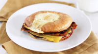 Fried Egg Donut Breakfast Sandwich Recipe - Tablespoon.com image