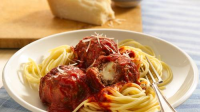 Cheese-Stuffed Meatballs and Spaghetti Recipe ... image