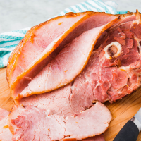 Best Spiral Ham Recipe - How To Cook A Spiral Ham - Delish image
