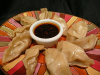 Pot Stickers With Spicy Dipping Sauce Recipe - Food.com image