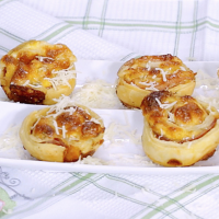 Bacon and Scrambled Egg Puff Pastry Rolls | So Delicious image