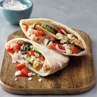 Greek Grilled Chicken Pitas Recipe: How to Make It - Taste of Home: Find Recipes, Appetizers, Desserts, Holiday Recipes & Healthy Cooking Tips image