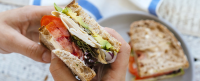Smashed chickpea salad sandwich with tahini, dill and ... image