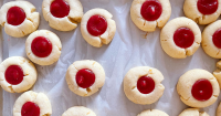 Cranberry Curd Thumbprint Cookies Recipe - PureWow image