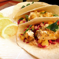 Easy Fish Tacos with Mango-Pineapple Slaw Recipe | Allrecipes image
