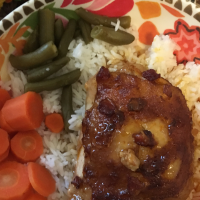 Yummy Baked Chicken Thighs in Tangy Sauce Recipe | Allrecipes image