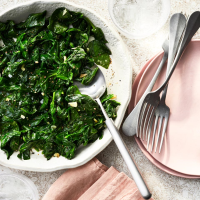 Wilted Spinach with Garlic Recipe | EatingWell image