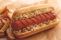 Grilled Smoked Sausage and Sauerkraut on a Bun | Butterball® image