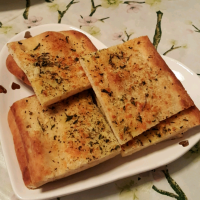 Garlic Cheese Flatbread Recipe | Allrecipes image