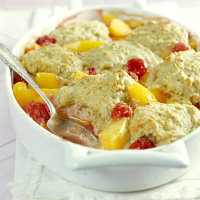 Peach-Berry Cobbler Recipe | EatingWell image