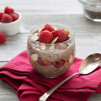 Cocoa-Chia Pudding with Raspberries Recipe | EatingWell image