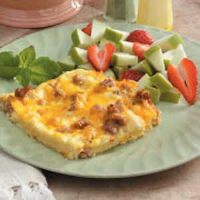 Sausage and Cheddar Breakfast Casserole Recipe: How to Make It - Taste of Home: Find Recipes, Appetizers, Desserts, Holiday Recipes & Healthy ... image