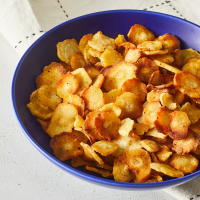 Baked Parsnip Chips Recipe | EatingWell image