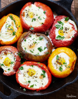 Eggs Baked in Tomatoes Recipe - PureWow image