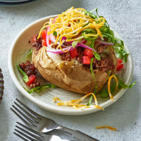 Cheeseburger Stuffed Baked Potatoes Recipe | EatingWell image