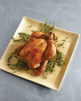 Roast Chicken with Garlic and Thyme Recipe | Martha Stewart image