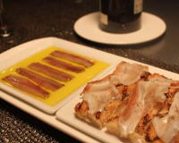 Menaica Anchovies with Roasted Bread & Herb-Cured Lardo Recipe image