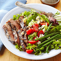 Steakhouse Salad with Ribeye and Blue Cheese | Midwest Living image