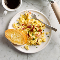 Scrambled Eggs with Cream Cheese Recipe: How to Make It - Taste of Home: Find Recipes, Appetizers, Desserts, Holiday Recipes & Healthy Cooking Tips image