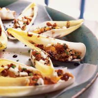Endive Stuffed with Goat Cheese and Walnuts Recipe | MyRecipes image