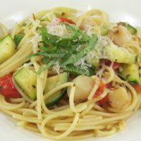 Pasta with Scallops, Zucchini, and Tomatoes Recipe | Allrecipes image