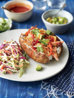 BBQ Pork Loaded Baked Potatoes Recipe | Southern Living image