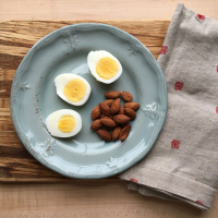 Hard-Boiled Egg & Almonds Recipe | EatingWell image
