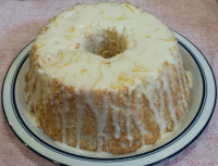 Angel Food Cake with Lemon Glaze | Just A Pinch Recipes image