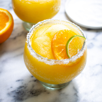 Frozen Orange Margaritas Recipe | EatingWell image
