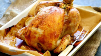 Classic roast chicken with bread and butter stuffing Recipe | Good Food image