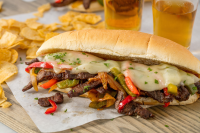 Easy Homemade Philly Cheesesteaks Recipe - How to Make a Philly Cheesesteak Sandwich - Delish image