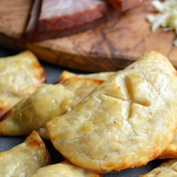 Easy Ham & Cheese Hand Pies Recipe - Food Fanatic image