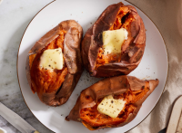Best Baked Sweet Potato Recipe - How to Bake Whole Sweet Potatoes in Oven - Recipes, Party Food, Cooking Guides, Dinner Ideas - Delish.com image