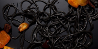 Black and Orange Halloween Pasta Recipe Recipe | Epicurious image