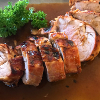 Tangy Grilled Pork Tenderloin Recipe | Allrecipes image