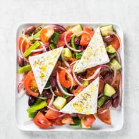 Horiatiki Salata (Hearty Greek Salad) | Cook's Illustrated image