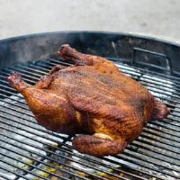 Charcoal Grill-Roasted Whole Chicken | Cook's Illustrated image