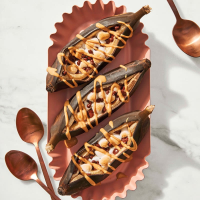 Grilled banana split boats with peanut butter sauce ... image