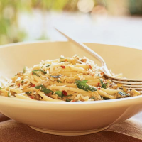 Spaghetti with White Clam Sauce Recipe | MyRecipes image
