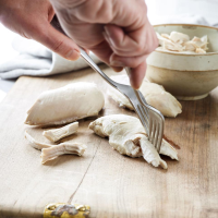 Best Poached Chicken Recipe | EatingWell image