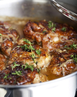 Emeril's Braised Chicken Thighs Recipe | Martha Stewart image
